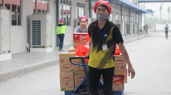 In Vietnam, thousands of workers return Tet gifts over fake product doubt