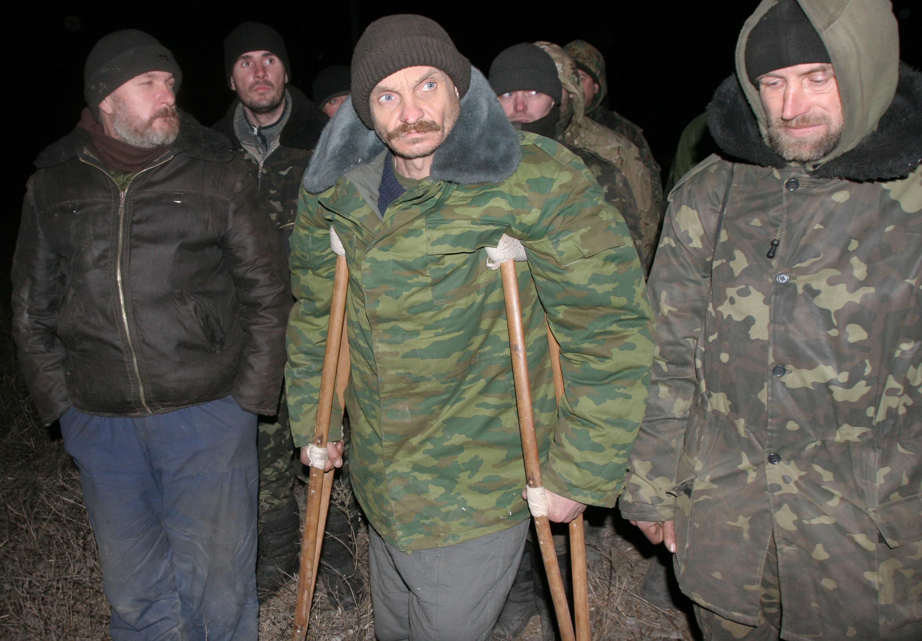 Ukraine, pro-Russia rebels swap dozens of prisoners