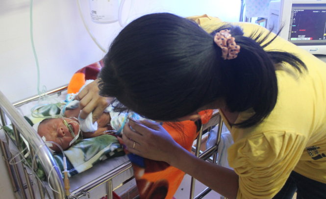 Vietnam neonate makes stunning recovery after ejection from womb into toilet tub