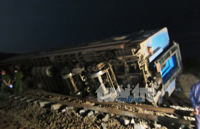Train hits truck, throwing three carriages off railway, killing engine driver in Vietnam