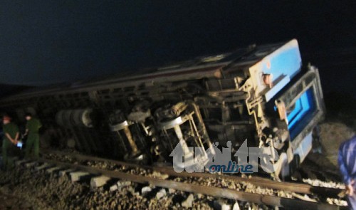 Train hits truck, throwing three carriages off railway, killing engine driver in Vietnam