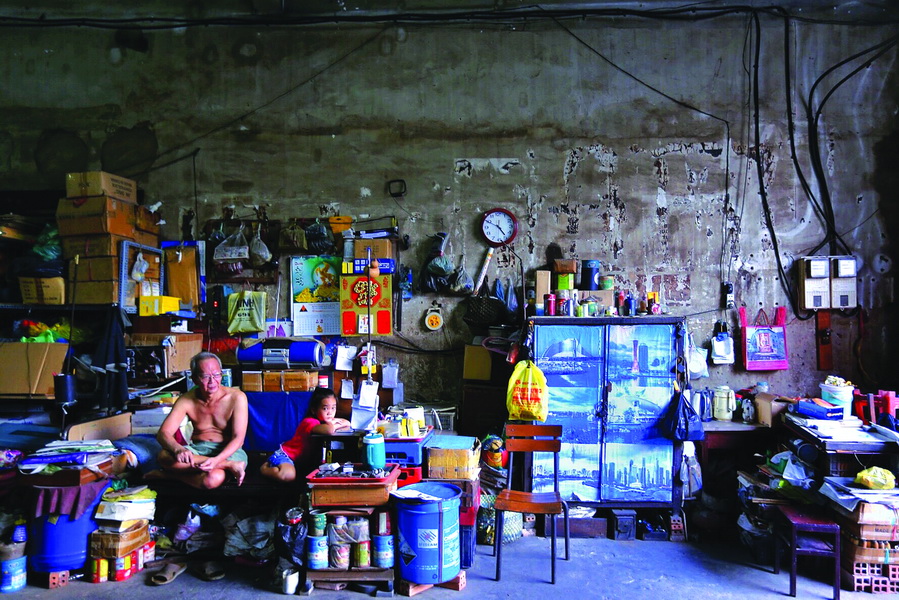 This old man and his family have run their small grocery from this small place in an alley in District 5 for more than 40 years.