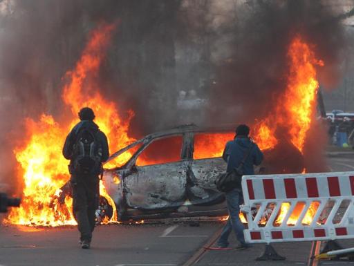 Dozens injured in anti-ECB riots
