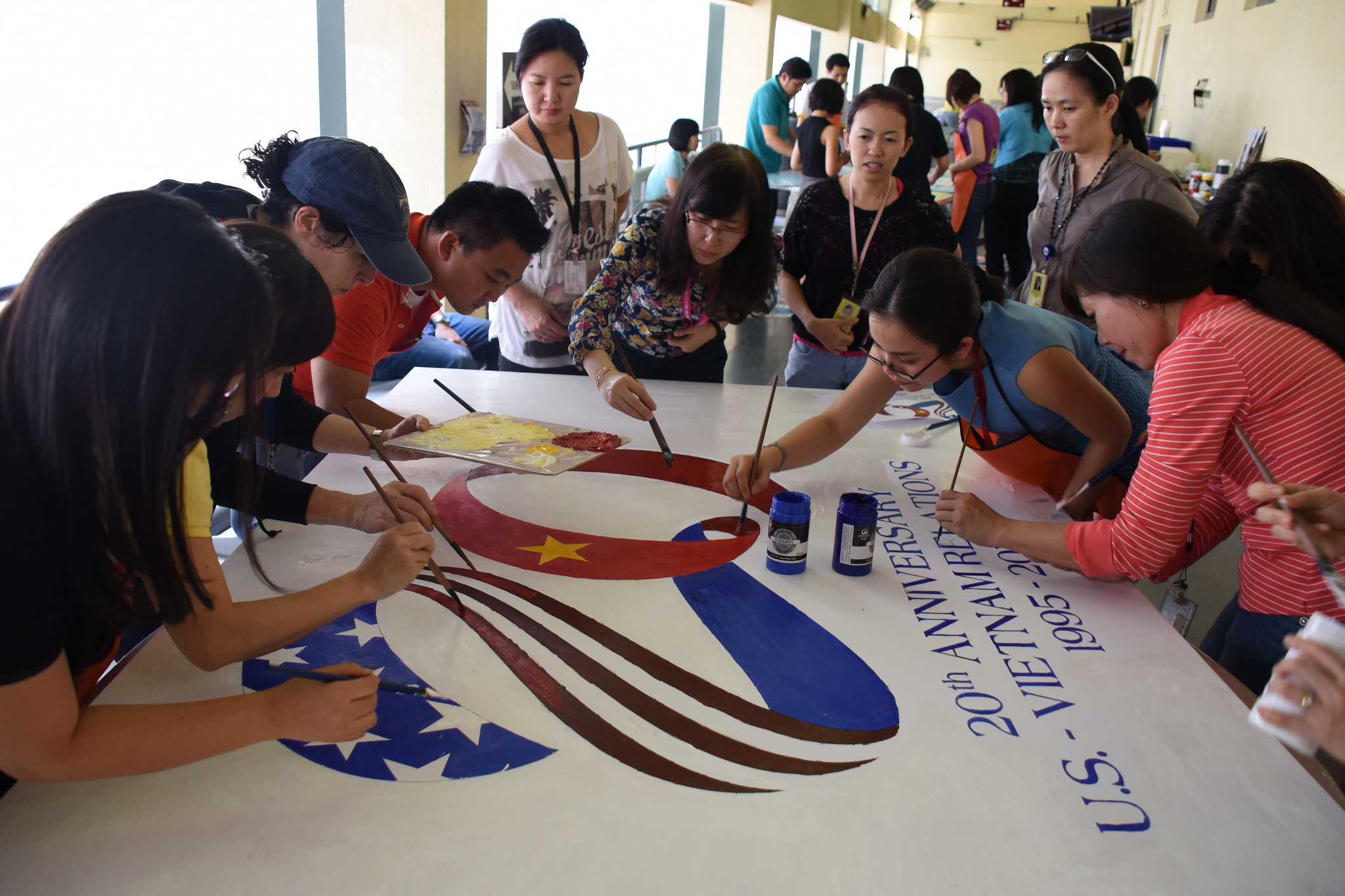 U.S. Consulate General staff paints canvases to celebrate Vietnam – U.S. diplomatic relations