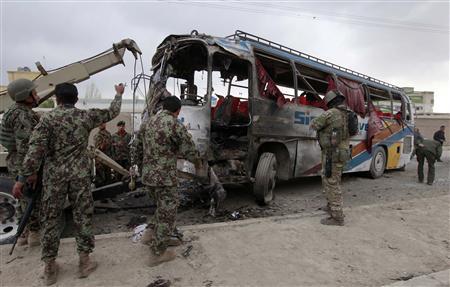 Masked gunmen kill 13 Afghans in third bus attack in a month