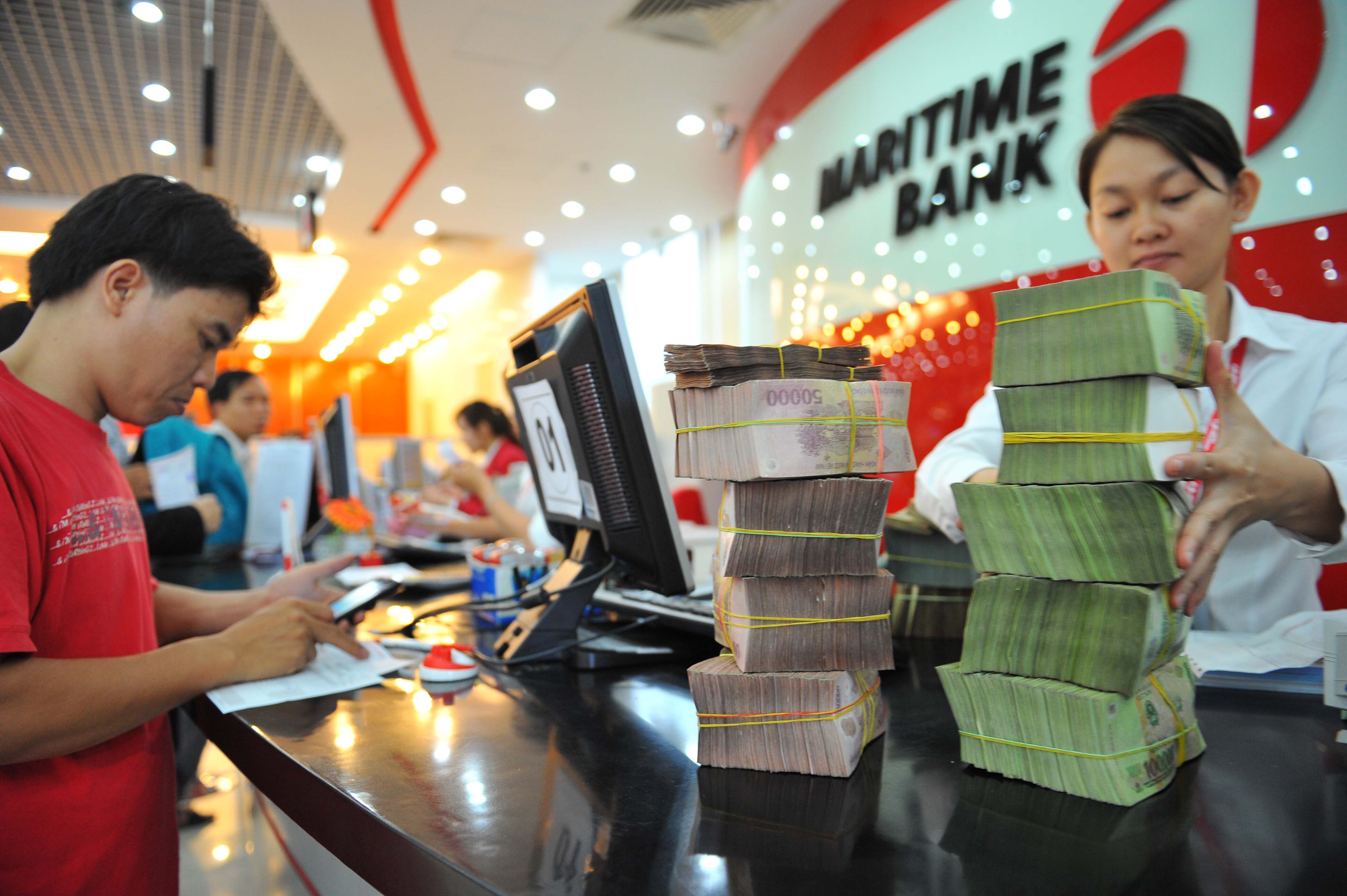 Vietnam central bank taking over another troubled lender