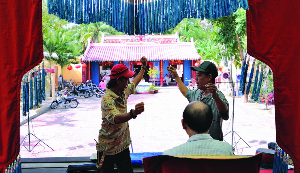 Classical opera is now performed on the grounds of a village communal house in a Mekong Delta province.