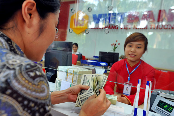 In Vietnam, US dollar appreciation makes some quite happy, leaves others in trouble