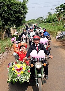 In Vietnam, bride accompanied to groom’s home by Belarusian Minsk convoy