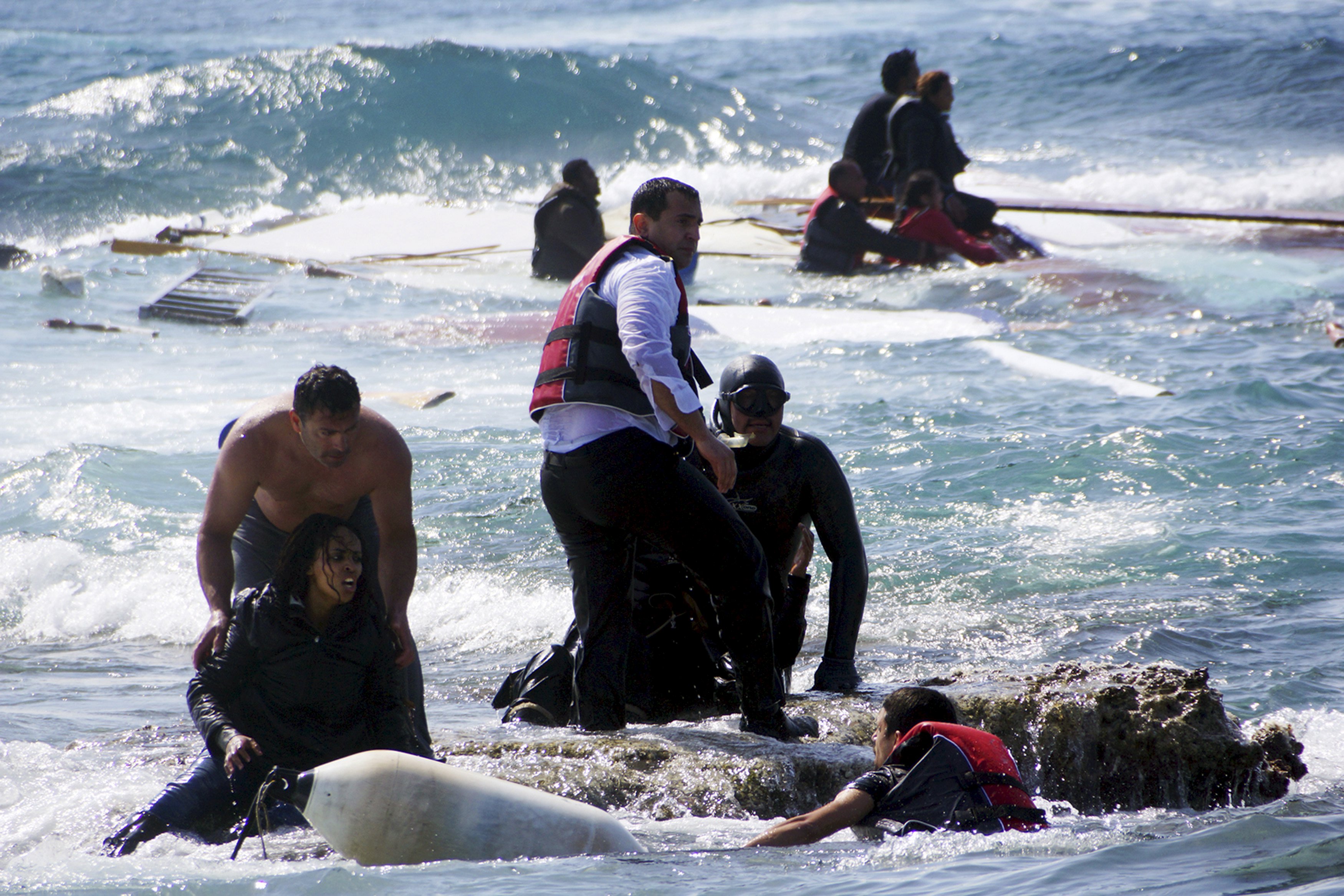 Migrants' bodies brought ashore as EU proposes doubling rescue effort