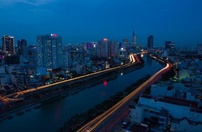 The Ben Nghe Canal, with Vo Van Kiet Boulevard on its left and Ben Van Don Street on its right.