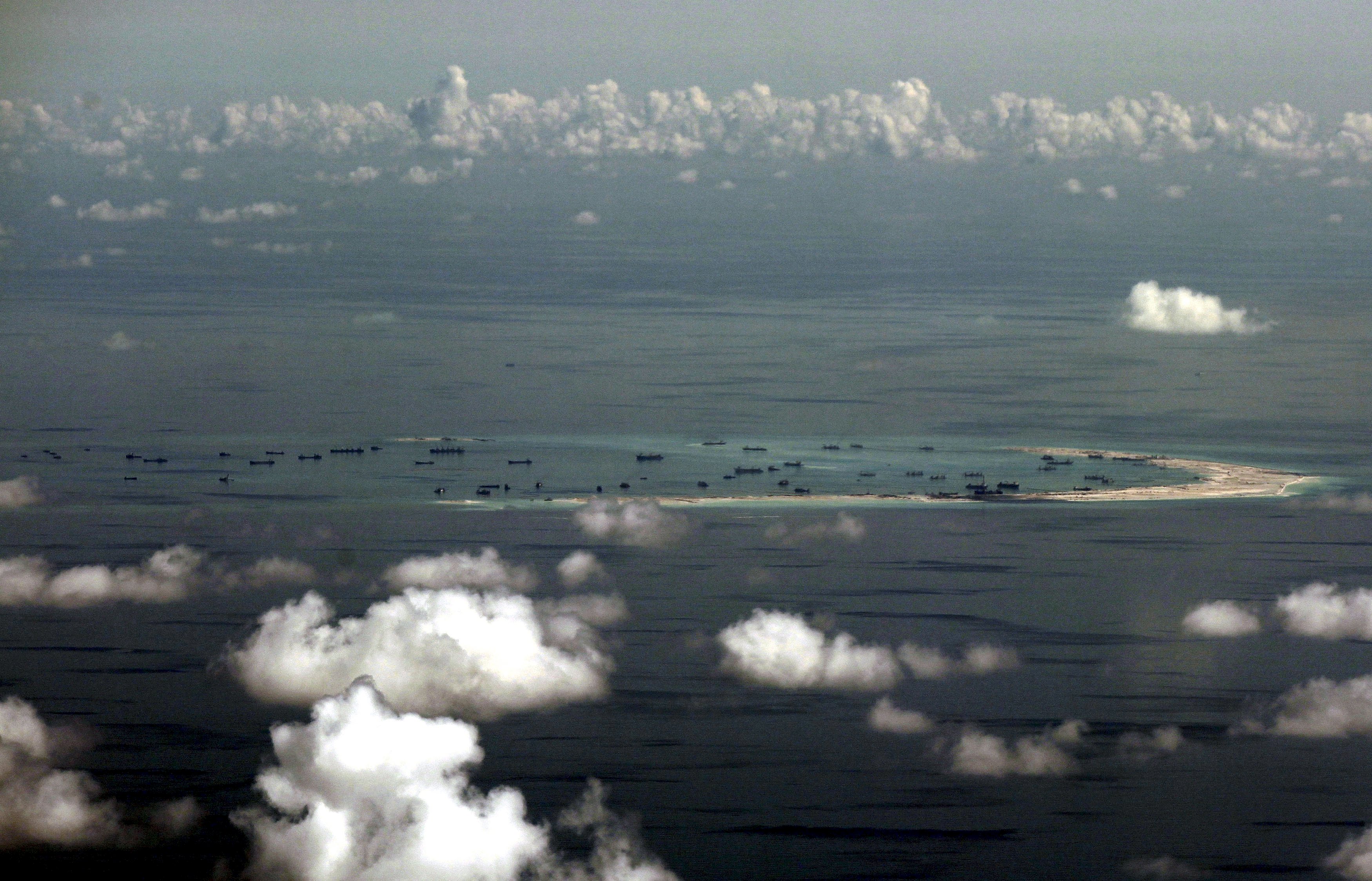 China navy warns U.S. spy plane in disputed East Vietnam Sea: CNN