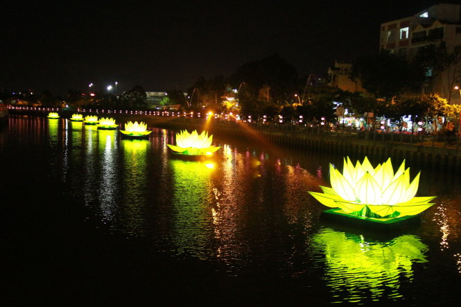 Lighted lotuses glitter on Saigon’s revived canal in celebration of Vesak