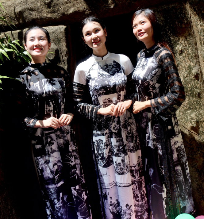 ‘Ao dai’ featuring wartime images displayed at exhibit in Vietnam tunnel