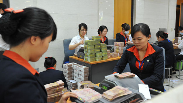 Mergers put bankers on brink of layoffs in Vietnam
