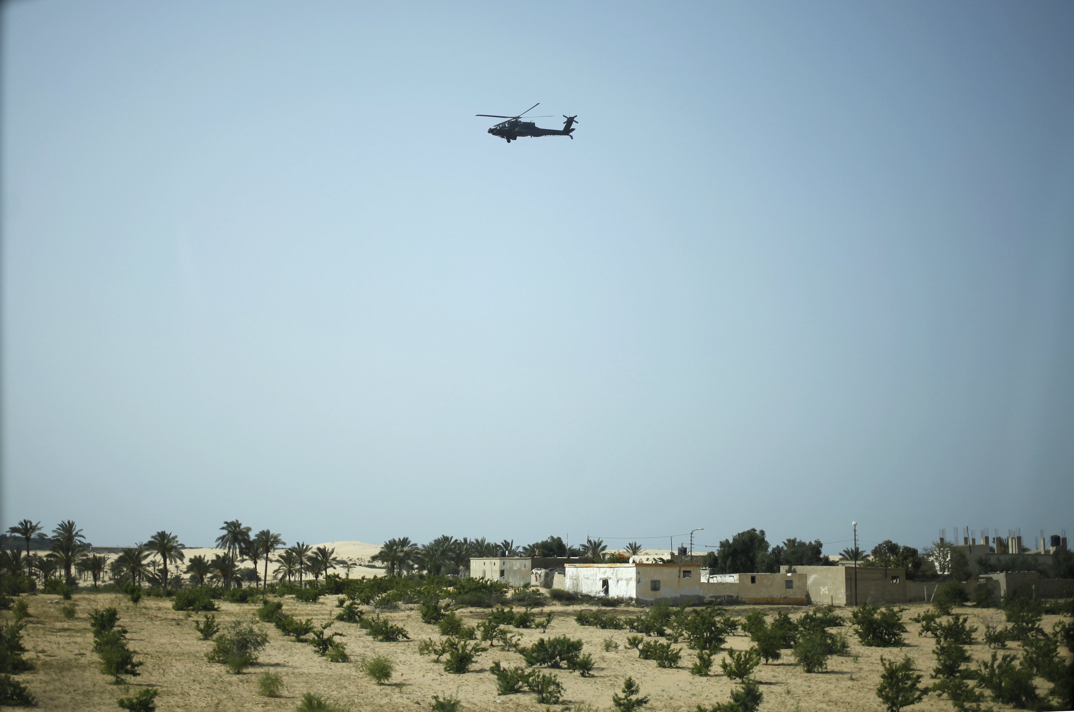 Egypt militants fire rockets toward airport used by multinational peacekeepers: sources