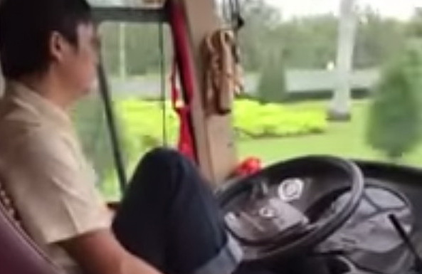 Vietnam driver suspended for putting on socks, shoes while steering passenger bus