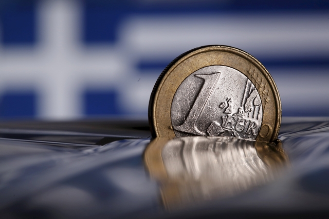 Euro zone clinches deal with Greece after all-night haggle