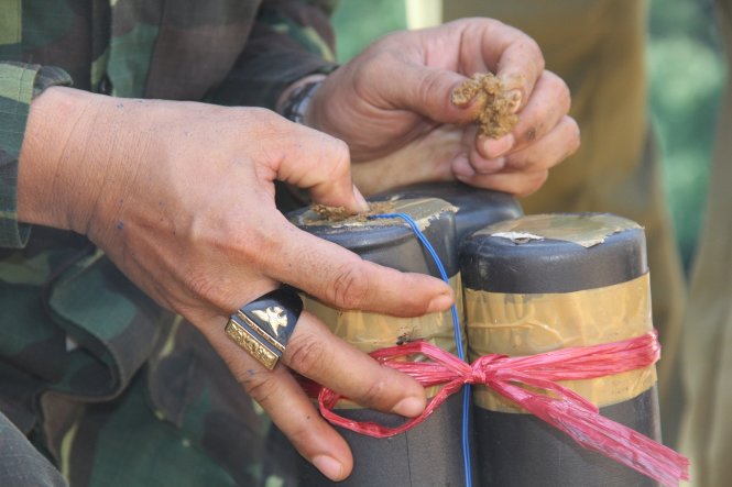 Sappers use explosives to level illegal gold pits in central Vietnam