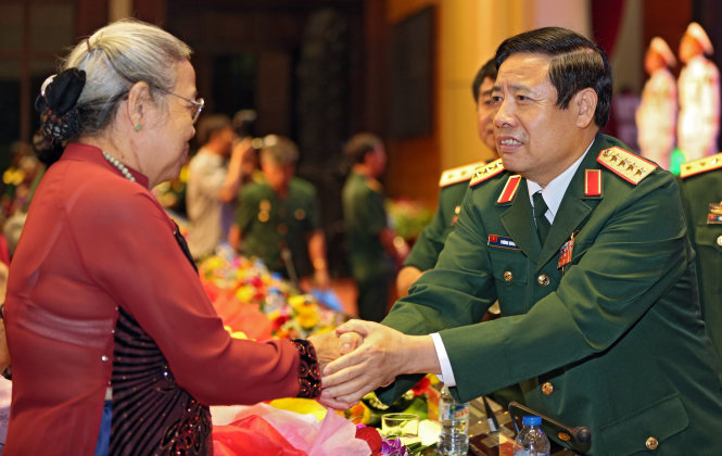 Vietnam defense minister Phung Quang Thanh attends art program in Hanoi