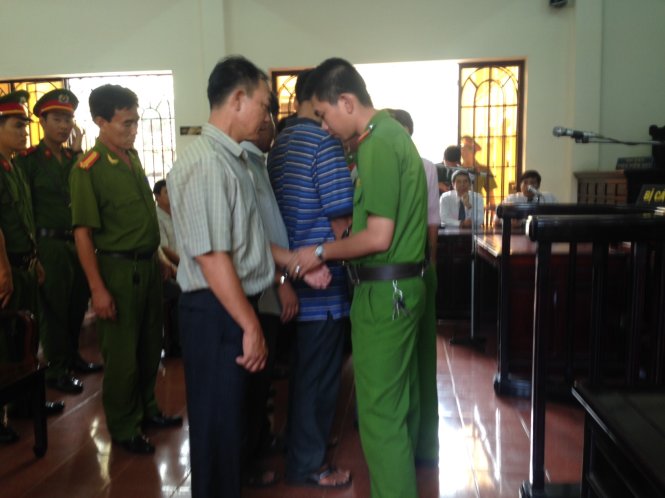Vietnamese ex-guards get up to 9 years for beating junkie to death
