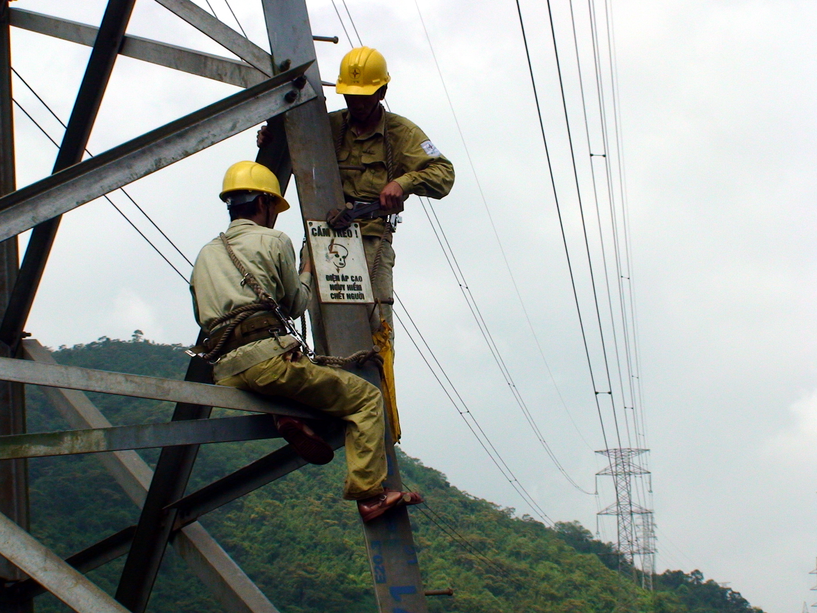 Meet the workers who take care of high voltage electricity poles in Vietnam