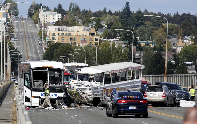 Four killed, 12 critical after tour buses collide on Seattle bridge