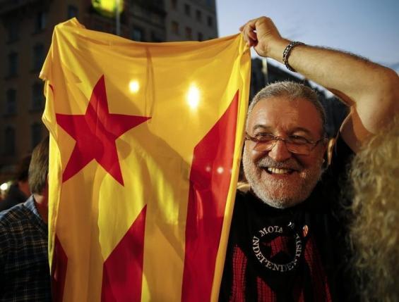 Victorious Catalan separatists claim mandate to break with Spain