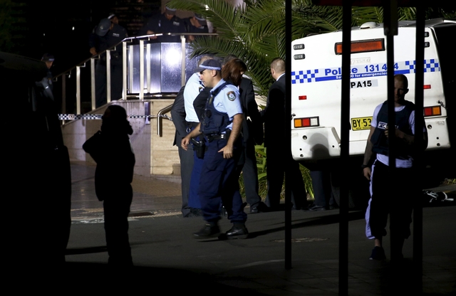 Australian officials say Sydney police HQ shooting 