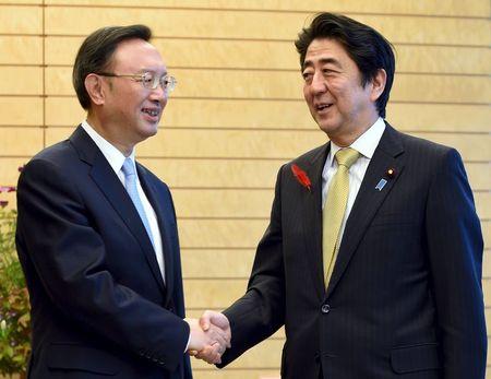 Japan, China vow to keep up ties, despite Nanjing row, spying arrests