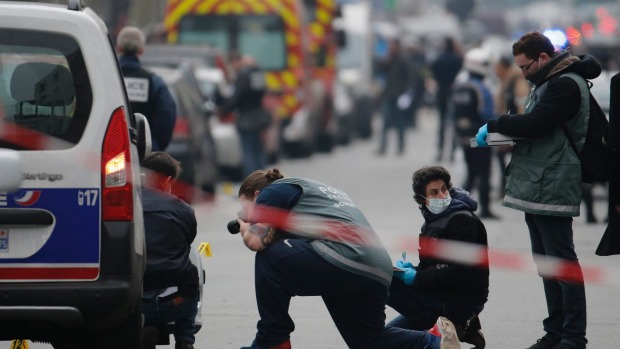 Gunfire erupts in Paris as police swoop on suspected mastermind