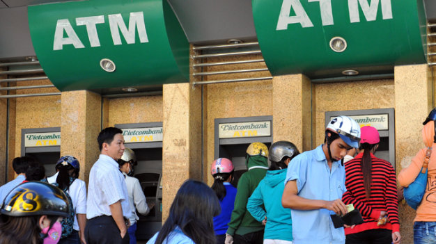 In about-face, Vietnam’s Vietcombank resumes ATM service, money transfer for foreigners
