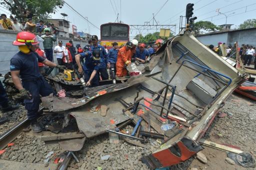 Bus and train crash in Indonesia kills 16