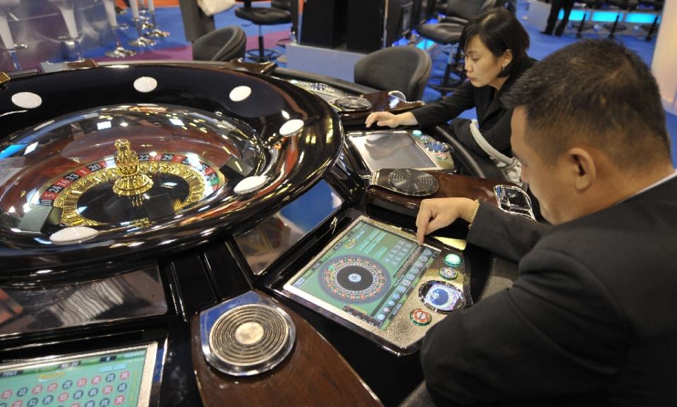 Macau gaming revenue falls 34% in 2015