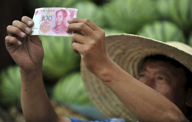 China lets yuan fall faster, sends markets reeling