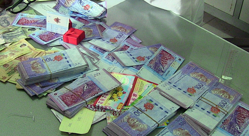 Malaysian detained for trading counterfeit money in Vietnam