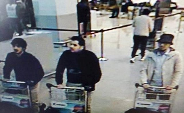 Police hunt suspect after Islamic State kills 30 in Brussels suicide attacks