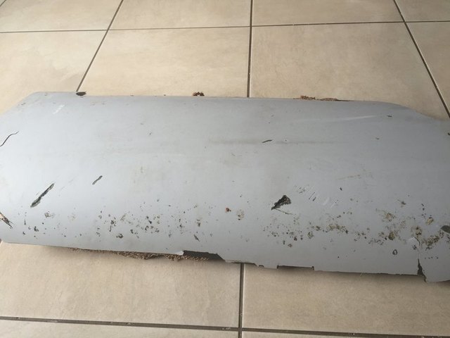 Malaysia says should search for more possible MH370 debris in South African coast