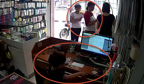 Women stage distraction for kid to steal iPhone from Hanoi shop (footage)