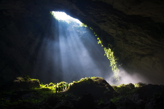 A giant sunbeam illuminates a part of Son Doong Cave in Quang Binh Province.