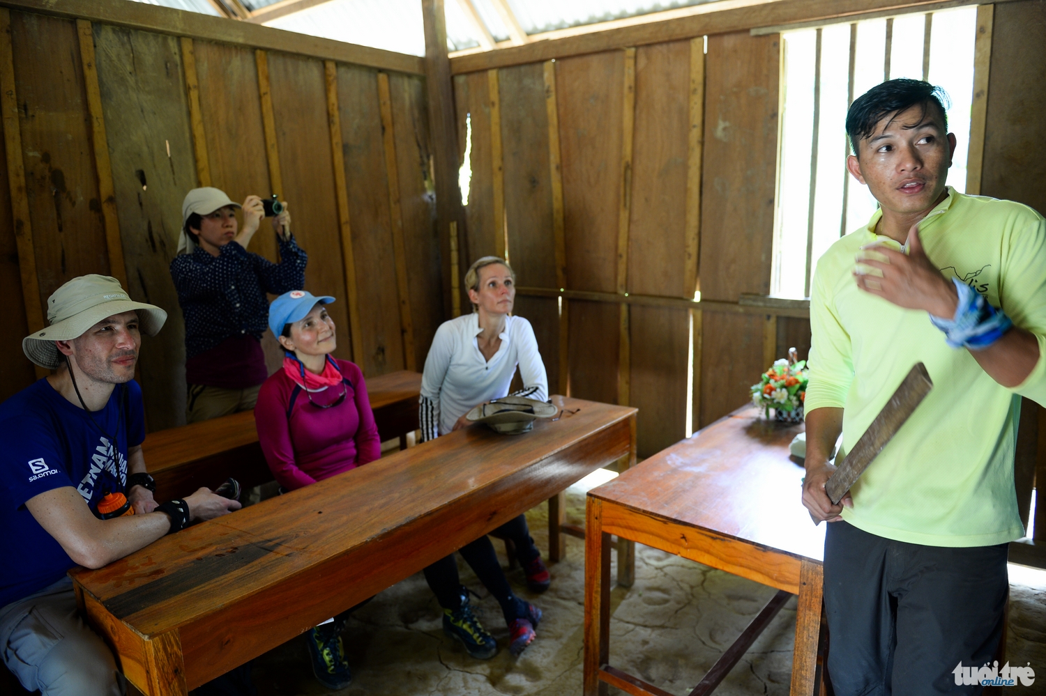 L to R: Giles Lever, Cecilia Piccioni and Camilla Mellander, Ambassadors of the UK, Italy, and Sweden, visit a class in Doong Village on the way to Son Doong.