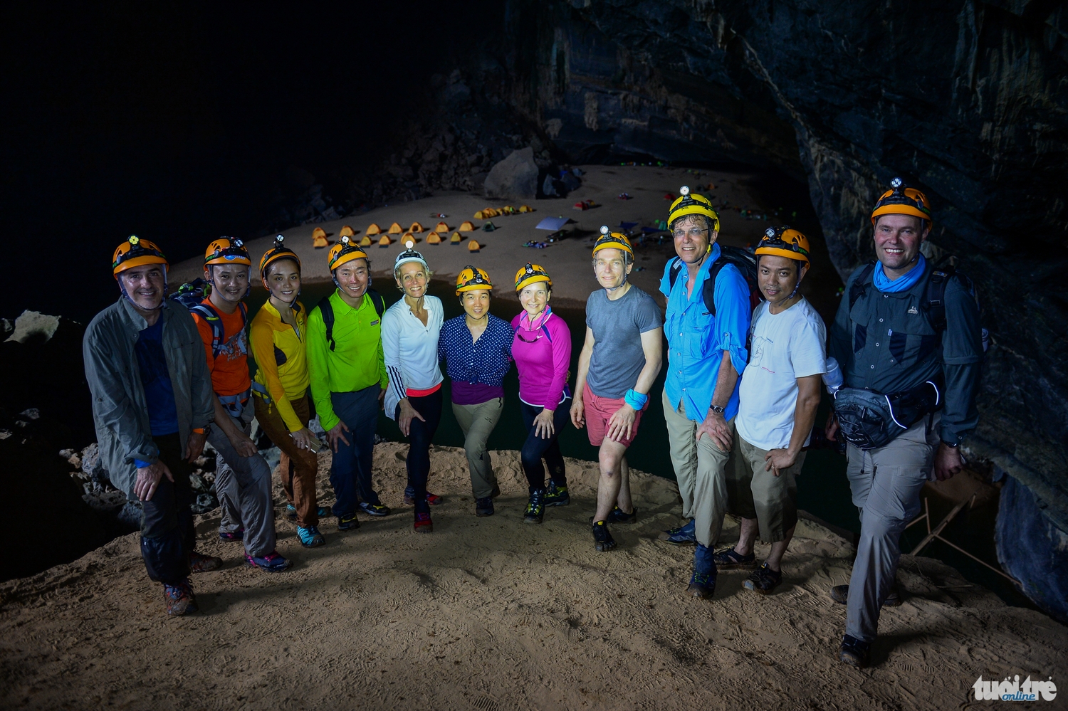 The delegation poses in front of En Cave, the first stay of the expedition to Son Doong Cave.