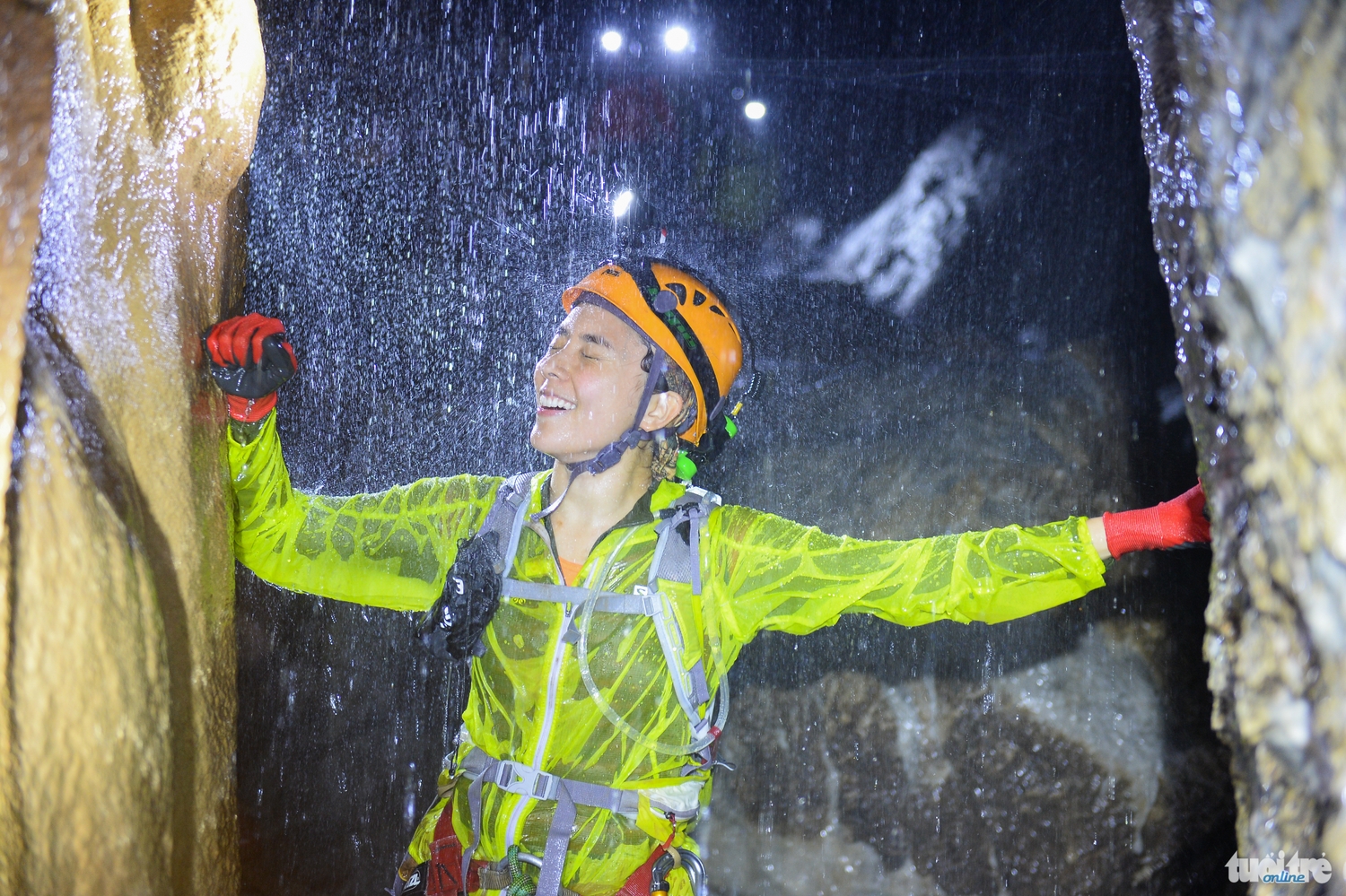 Beauty queen Duong Truong Thien Ly enjoys cool water in the cave.