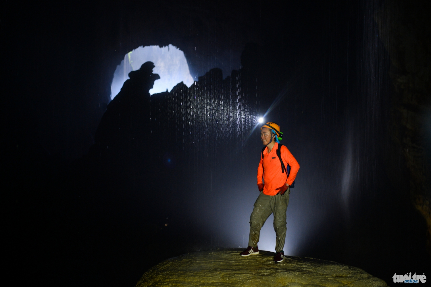 Secretary-General of the Vietnam National Commission for UNESCO Pham Sanh Chau stands on a rock called “Hand of Dog” before reaching the first doline in Son Doong.