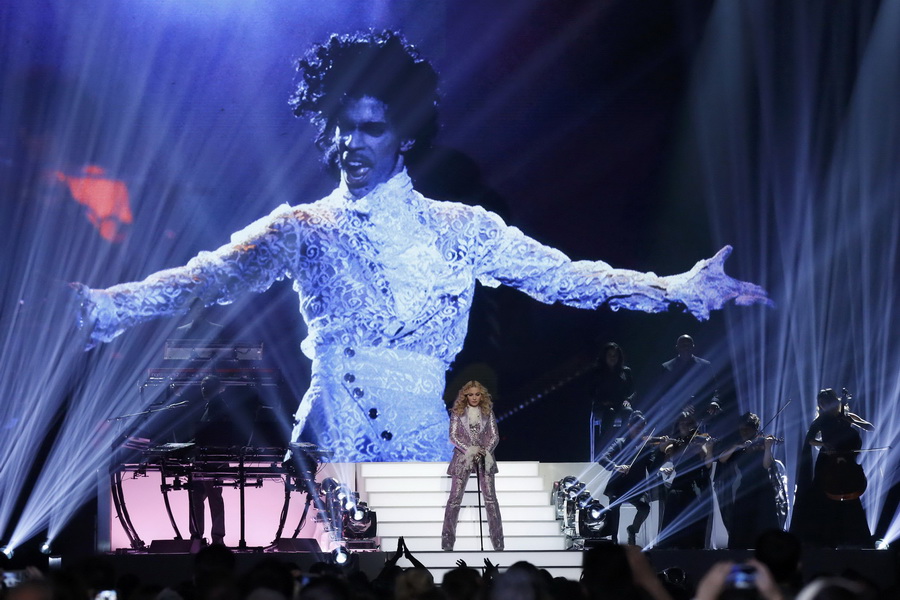 Madonna, Kesha, Dion rule the stage at emotional Billboard Awards