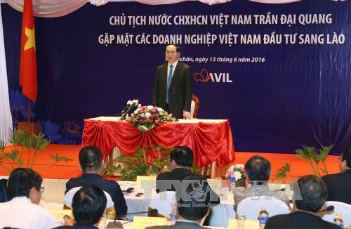 State president praises efforts of Vietnamese investors in Laos