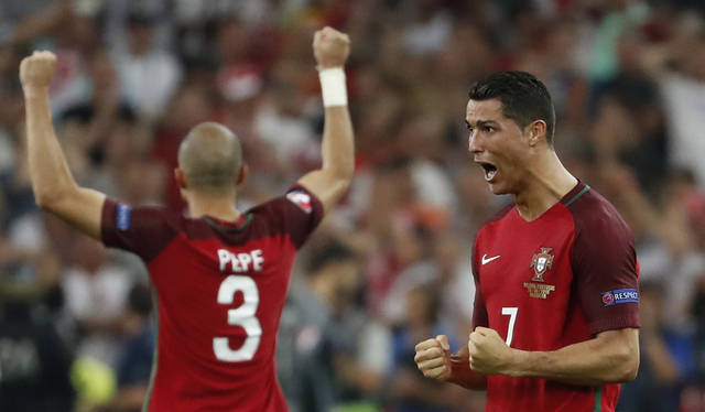 Portugal beat Poland in shootout to reach semis