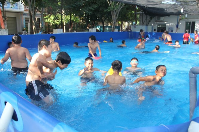 Men build three swimming pools for $3,600 in central Vietnam