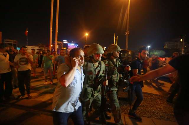 Turkish coup bid crumbles as crowds answer call to streets, Erdogan returns