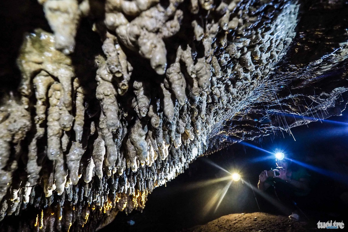 Incredible stalactites hang from the cave roof and walls.
